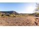 Large lot with desert landscape and mountain backdrop at 1060 S Kellis Rd, Wickenburg, AZ 85390