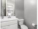 Clean and modern bathroom with white vanity and fixtures at 12773 W Caraveo Pl, Peoria, AZ 85383