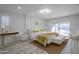 Elegant bedroom with pool view, featuring a king-size bed and gold accents at 1323 W Tuckey Ln, Phoenix, AZ 85013