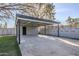 Carport with storage and grassy backyard view at 1323 W Tuckey Ln, Phoenix, AZ 85013