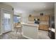 Kitchen boasts stainless steel appliances and breakfast bar at 14430 N Agave Dr, Fountain Hills, AZ 85268