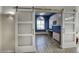 Home office with barn doors and built-in cabinetry at 14430 N Agave Dr, Fountain Hills, AZ 85268