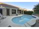 Inviting kidney-shaped pool with ample patio space at 14430 N Agave Dr, Fountain Hills, AZ 85268