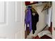 Standard-sized closet with hanging clothes and shelving at 14806 W Verde Ln, Goodyear, AZ 85395