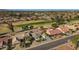 Aerial view showing home's location in a golf course community at 20410 N Meadowood Dr, Sun City West, AZ 85375