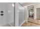 Clean bathroom with walk-in shower and tiled walls at 21559 E Russet Rd, Queen Creek, AZ 85142