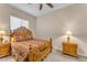 Cozy bedroom with wood bed frame and nightstands at 21559 E Russet Rd, Queen Creek, AZ 85142