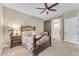 Bright bedroom with ensuite bathroom access at 21559 E Russet Rd, Queen Creek, AZ 85142