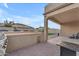 Outdoor kitchen with grill and seating area at 21559 E Russet Rd, Queen Creek, AZ 85142