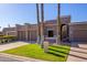 Two-car garage and attractive landscaping highlight this home's exterior at 25240 S Mohawk Dr, Sun Lakes, AZ 85248