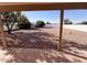 Large backyard with gravel covering and block wall at 26630 S Pinewood Dr # 14, Sun Lakes, AZ 85248