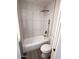 Clean bathroom with a bathtub, shower, and updated toilet at 26630 S Pinewood Dr # 14, Sun Lakes, AZ 85248