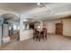 Open dining area with a table and chairs near the kitchen and living room at 3345 E Desert Cove Ave, Phoenix, AZ 85028