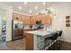 Modern kitchen with light wood cabinets and stainless steel appliances at 4049 E Roy Rogers Rd, Cave Creek, AZ 85331