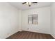 Simple bedroom with single window and ceiling fan at 44344 W Knauss Dr, Maricopa, AZ 85138