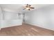 Spacious bedroom with ceiling fan and carpet flooring at 44344 W Knauss Dr, Maricopa, AZ 85138