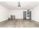 Garage with extra storage space and door to backyard at 44344 W Knauss Dr, Maricopa, AZ 85138
