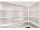 Large walk-in pantry with ample shelving at 44344 W Knauss Dr, Maricopa, AZ 85138