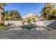 Relaxing pool with waterfall feature and spacious patio at 44344 W Knauss Dr, Maricopa, AZ 85138