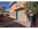 Back exterior view, two-story home with gravel backyard at 4831 W Dunbar Dr, Laveen, AZ 85339