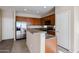 Kitchen with stainless steel appliances and wood cabinets at 4831 W Dunbar Dr, Laveen, AZ 85339