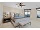 Spacious main bedroom with city views and a cozy sitting area at 7181 E Camelback Rd # 702, Scottsdale, AZ 85251