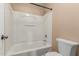 Clean bathroom with a bathtub and shower at 821 E Bradstock Way, San Tan Valley, AZ 85140