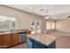 Kitchen with island and stainless steel appliances at 821 E Bradstock Way, San Tan Valley, AZ 85140