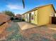 Small backyard with gravel landscaping and patio area at 8937 E Crescent Ave, Mesa, AZ 85208