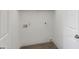 Small laundry room with washer and dryer hookups at 8937 E Crescent Ave, Mesa, AZ 85208