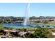 Aerial view of community with lake and fountain at 10835 N Cherry Hills Ct, Fountain Hills, AZ 85268