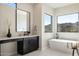 Modern bathroom with freestanding tub, quartz countertop and mountain views at 10835 N Cherry Hills Ct, Fountain Hills, AZ 85268