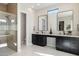 Elegant bathroom with double vanity, walk-in shower, and marble flooring at 10835 N Cherry Hills Ct, Fountain Hills, AZ 85268