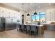 Modern kitchen with large island, stainless steel appliances, and wood cabinetry at 10835 N Cherry Hills Ct, Fountain Hills, AZ 85268