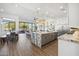 Open concept kitchen with large island, stainless steel appliances, and ample counter space at 10835 N Cherry Hills Ct, Fountain Hills, AZ 85268