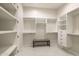 Spacious walk-in closet with built-in shelving and drawers at 10835 N Cherry Hills Ct, Fountain Hills, AZ 85268