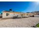 Backyard with covered patio and gravel at 13050 N 17Th Ave, Phoenix, AZ 85029