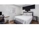 Bedroom with a full-size bed and built in desk at 13050 N 17Th Ave, Phoenix, AZ 85029