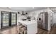 Updated kitchen with white cabinets, stainless steel appliances, and an island at 13050 N 17Th Ave, Phoenix, AZ 85029
