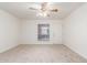 Bright and airy living room with ceiling fan at 1340 N Recker Rd # 214, Mesa, AZ 85205