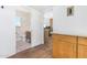 View of a stylish bathroom and kitchen with wood cabinets and tile flooring at 1345 W Edgemont Ave, Phoenix, AZ 85007