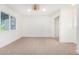 Bright and airy bedroom with neutral carpet and ample closet space at 1345 W Edgemont Ave, Phoenix, AZ 85007
