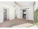 Bright bedroom with barn door entry and access to a large closet at 1345 W Edgemont Ave, Phoenix, AZ 85007
