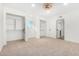 Large bedroom with two walk-in closets and an ensuite bathroom at 1345 W Edgemont Ave, Phoenix, AZ 85007