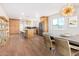 Kitchen and dining area with wood floors and modern decor at 1345 W Edgemont Ave, Phoenix, AZ 85007