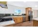 Updated kitchen with gas range and stainless steel appliances at 1345 W Edgemont Ave, Phoenix, AZ 85007