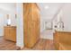 Updated kitchen boasts ample wood cabinetry and a farmhouse sink at 1345 W Edgemont Ave, Phoenix, AZ 85007