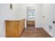 Laundry room with wood cabinets and tile flooring at 1345 W Edgemont Ave, Phoenix, AZ 85007