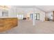 Open concept living area with pool view and bar at 1345 W Edgemont Ave, Phoenix, AZ 85007