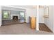 Open living room with a fireplace, wood floors, and built-in cabinetry at 1345 W Edgemont Ave, Phoenix, AZ 85007